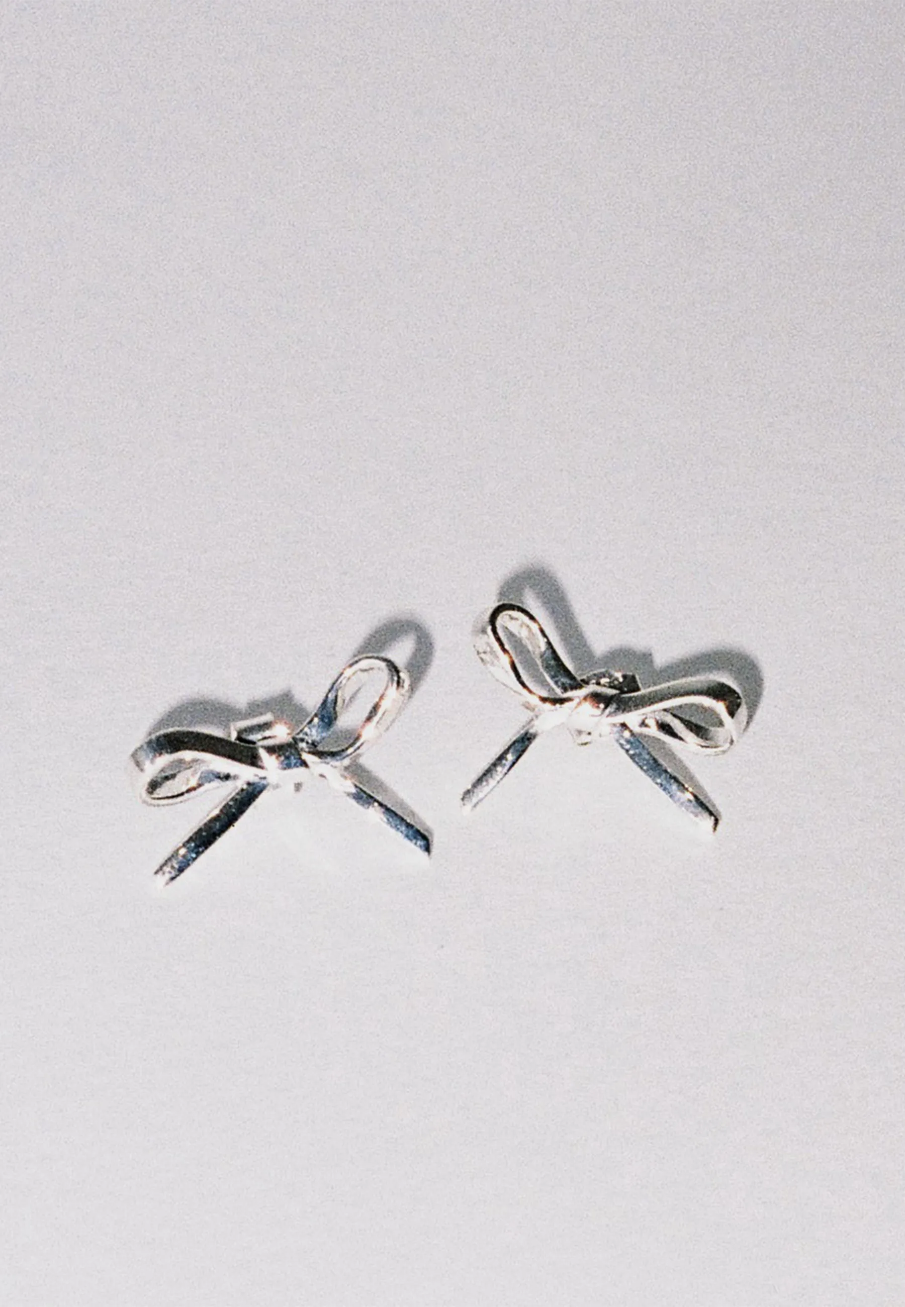 Bow Stud Earrings - Silver