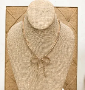 GOLD BEAD BOW NECKLACE